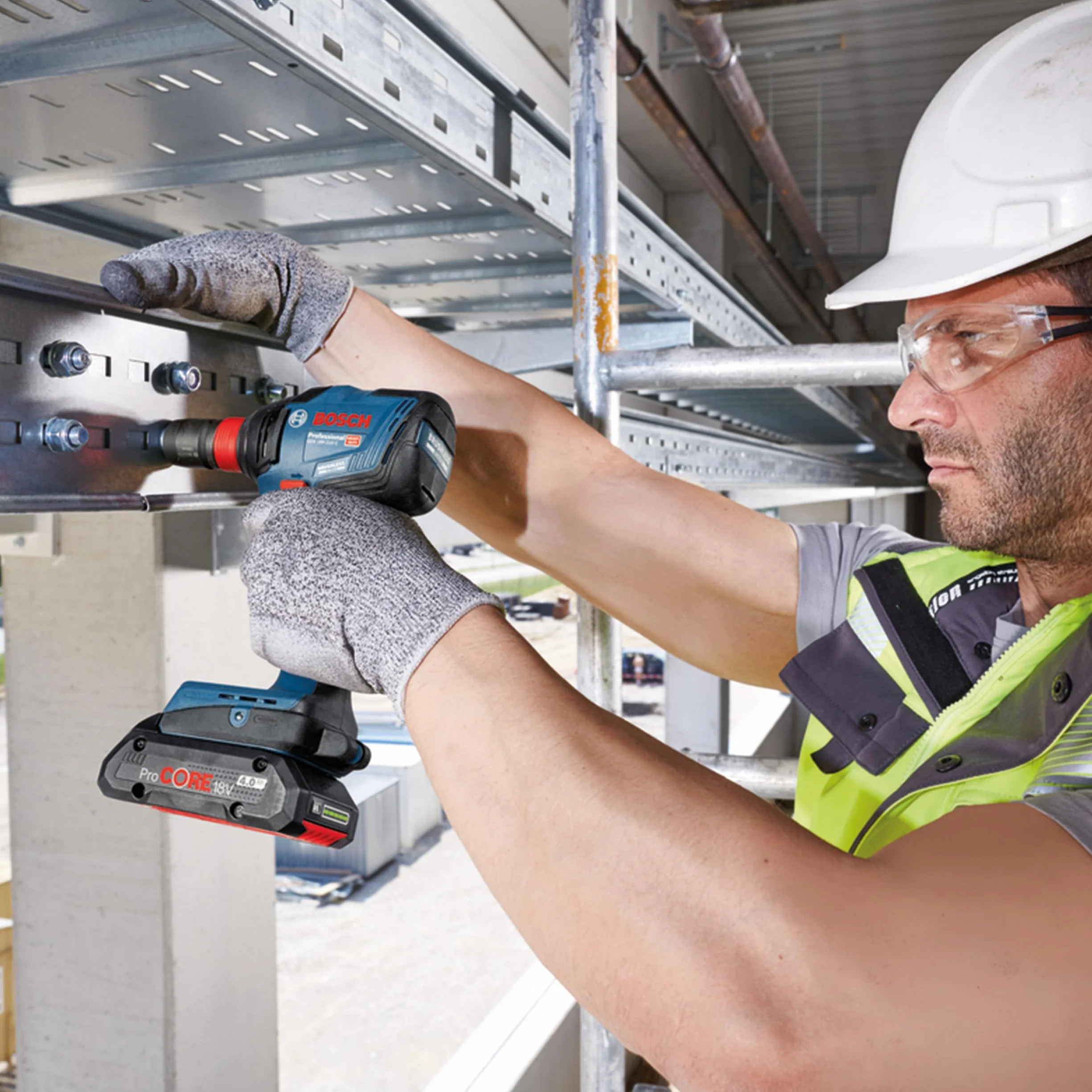 System profesjonalny 18 V firmy Bosch: akum. wkrętarka udarowa i klucz udarowy GDX 18V-210 C (maks. moment obr. 210 Nm, bez akum. i ładowarki, 1 moduł Bluetooth Low Energy GCY 42, walizka L-BOXX 136)